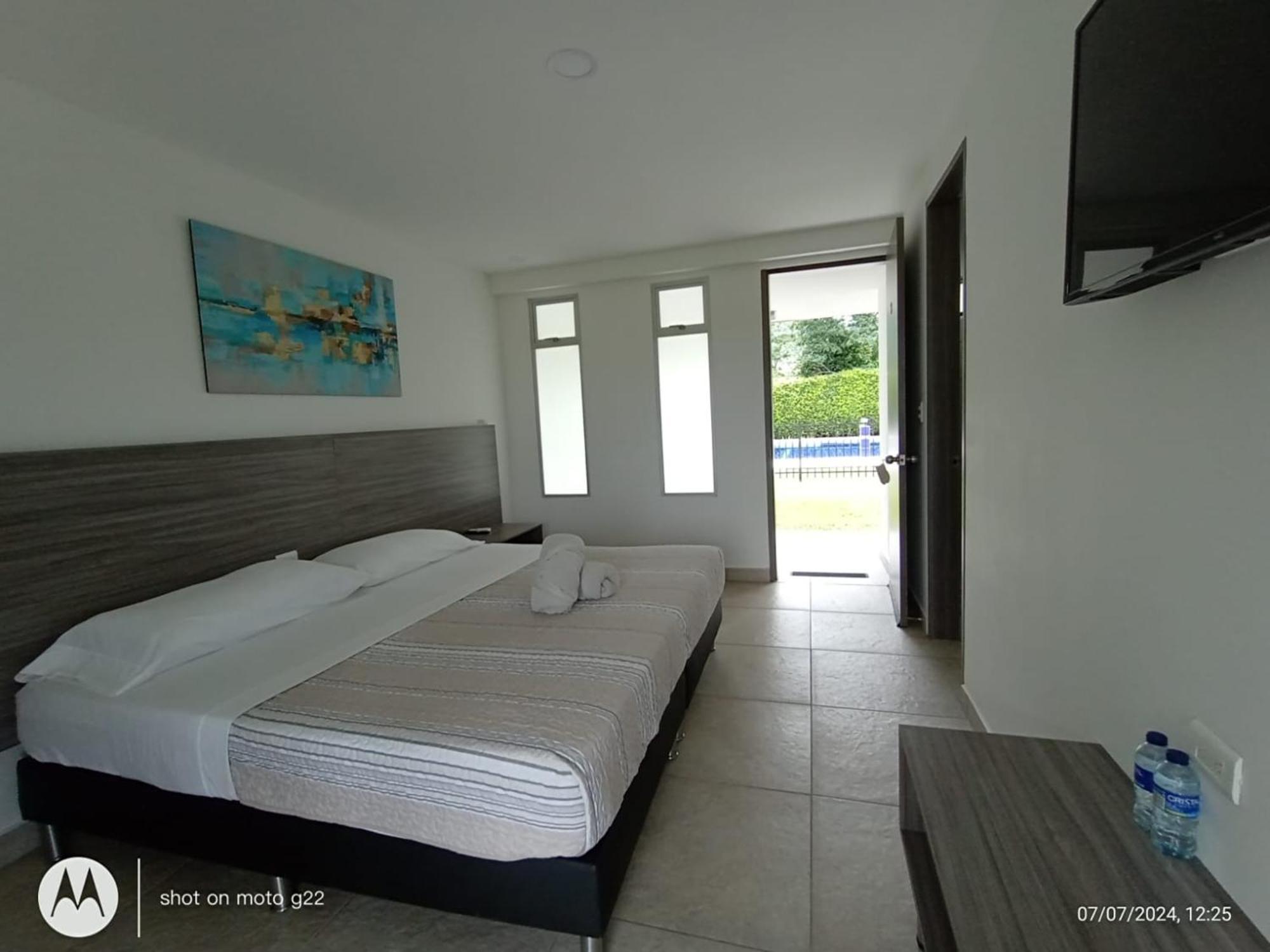 Hotel Palo Grande Cf Pereira Combia Bagian luar foto